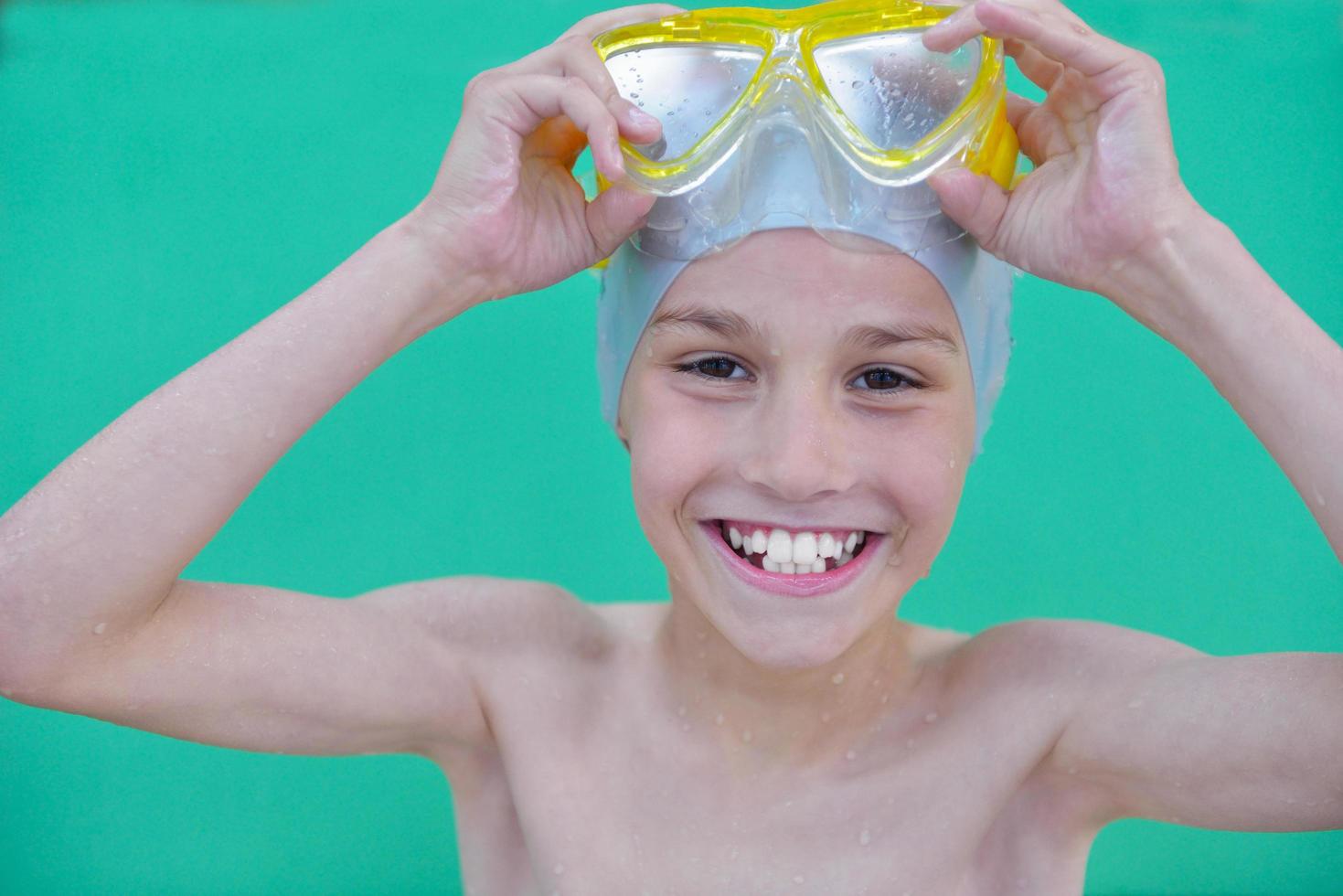 child portrait on swimming pool photo