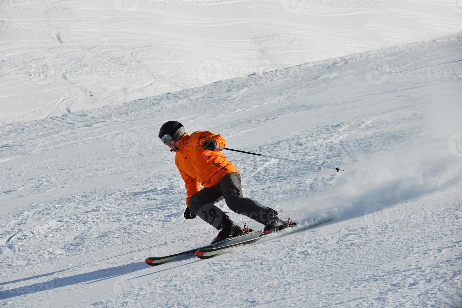 Skiers on mountain photo