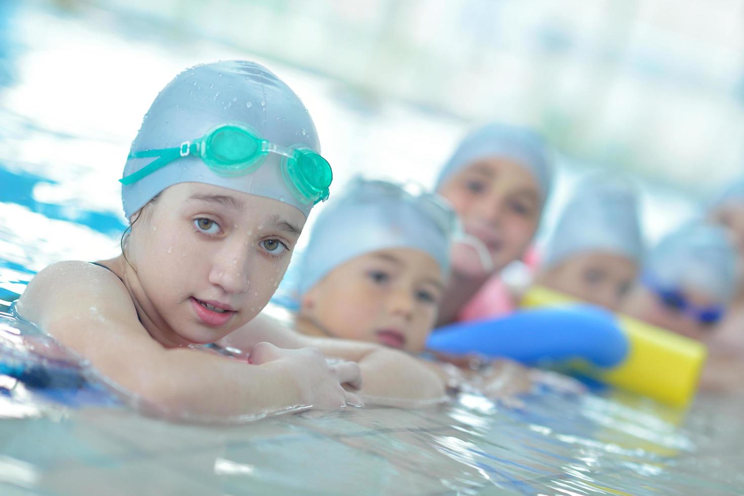 children group  at swimming pool photo
