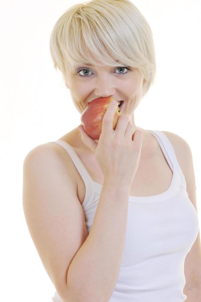 happy  young  woman eat green apple isolated  on white photo