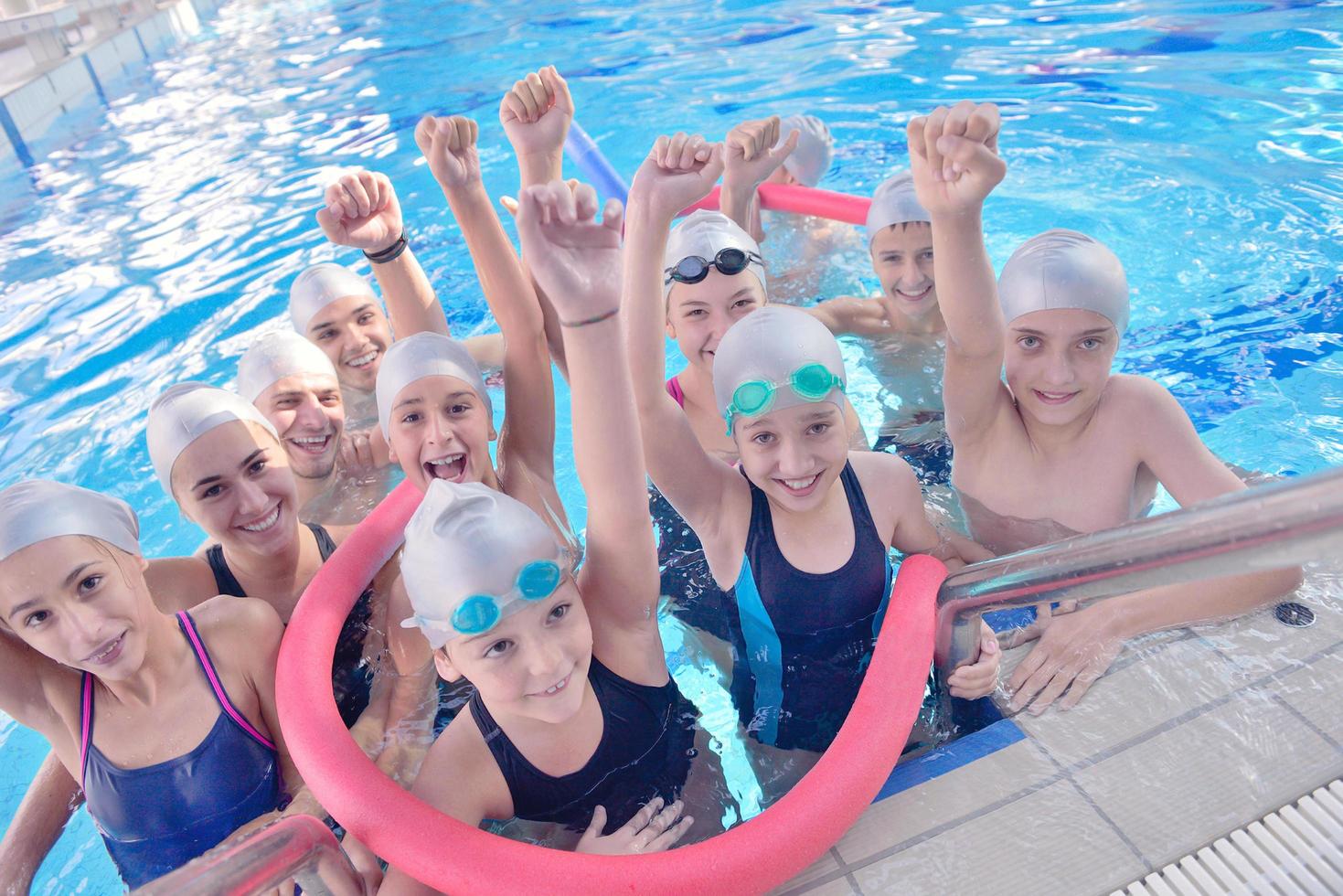 children group  at swimming pool photo