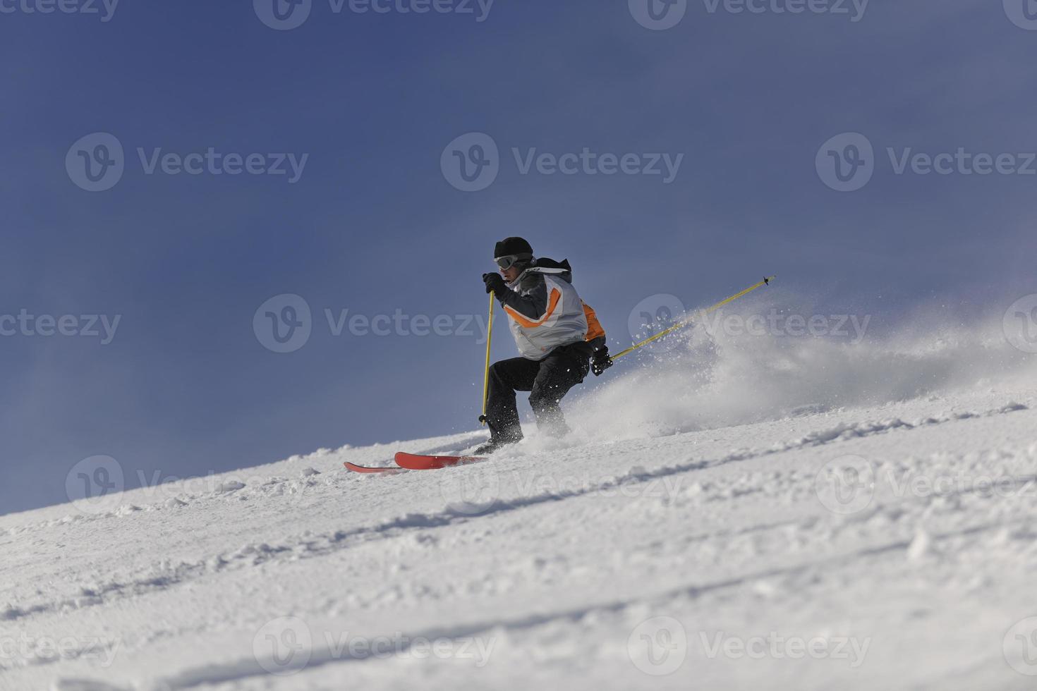 Skier on mountain photo