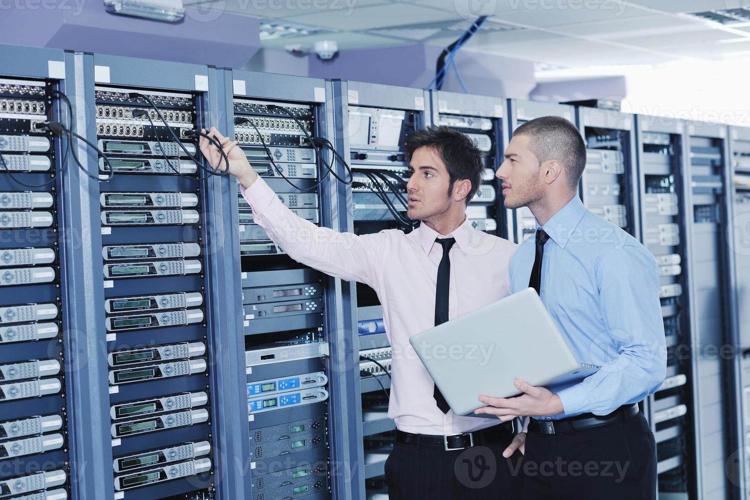 it enineers in network server room photo
