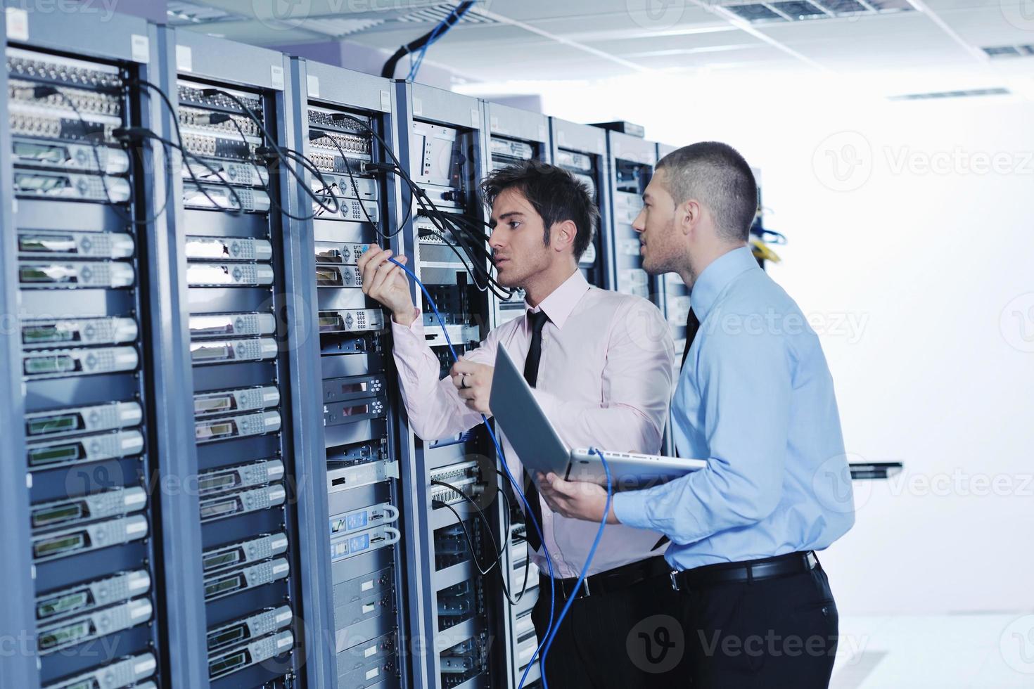 it enineers in network server room photo