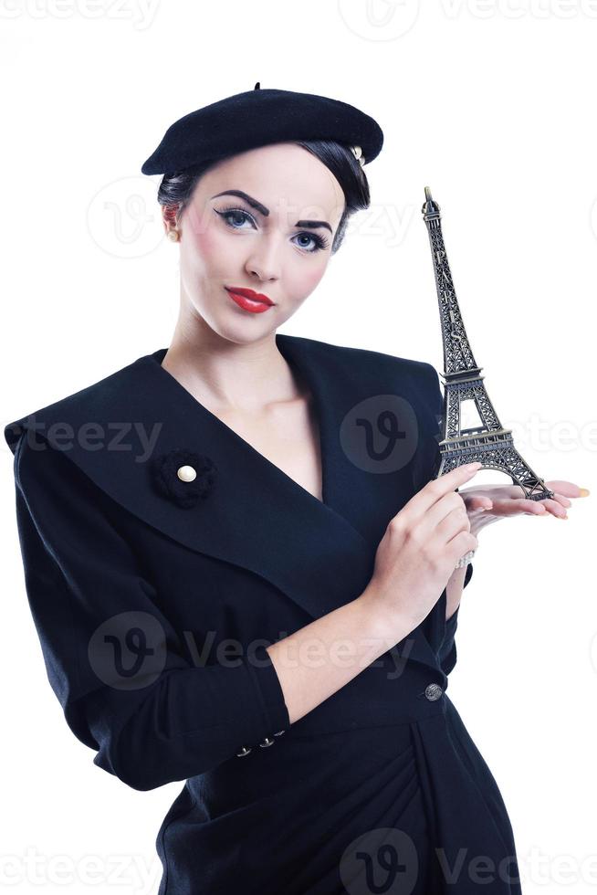 beautiful young woman with paris symbol eiffel tower photo