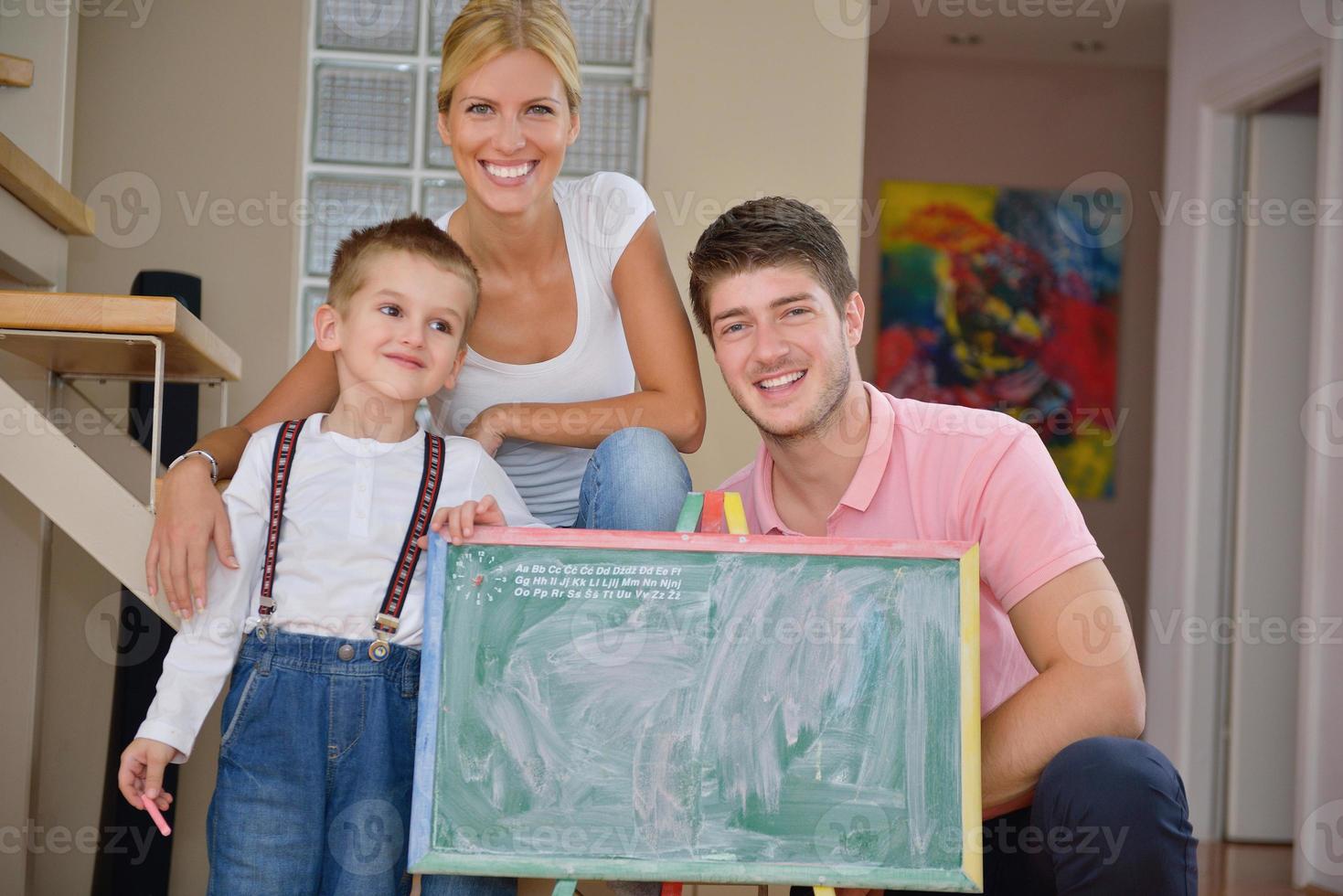 family drawing on school board at home photo