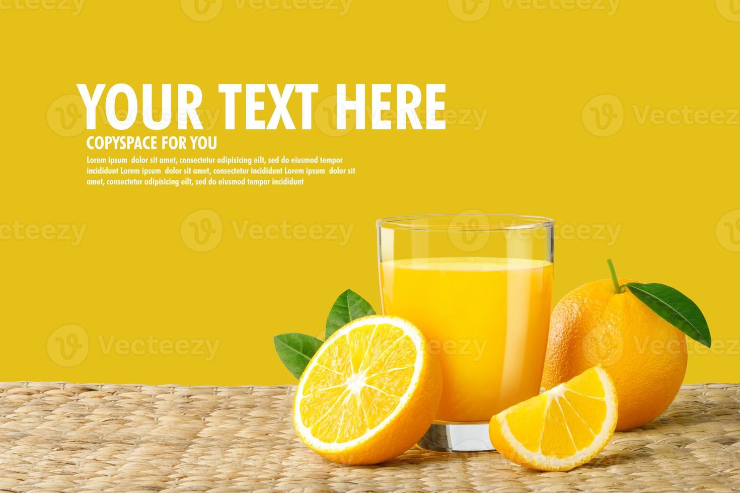 Glass of fresh orange juice on a rattan basket, Fresh fruits Orange juice in glass with group on yellow background with copy Space for your photo
