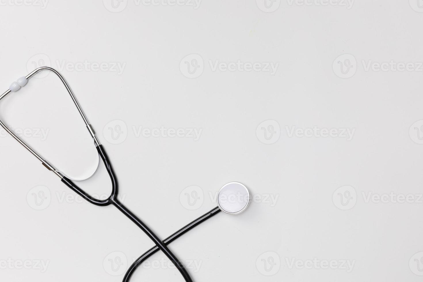 Creative flatlay of doctor medical equipment white table with stethoscope, Health care concept, Top view with copy space, Isolated on white photo