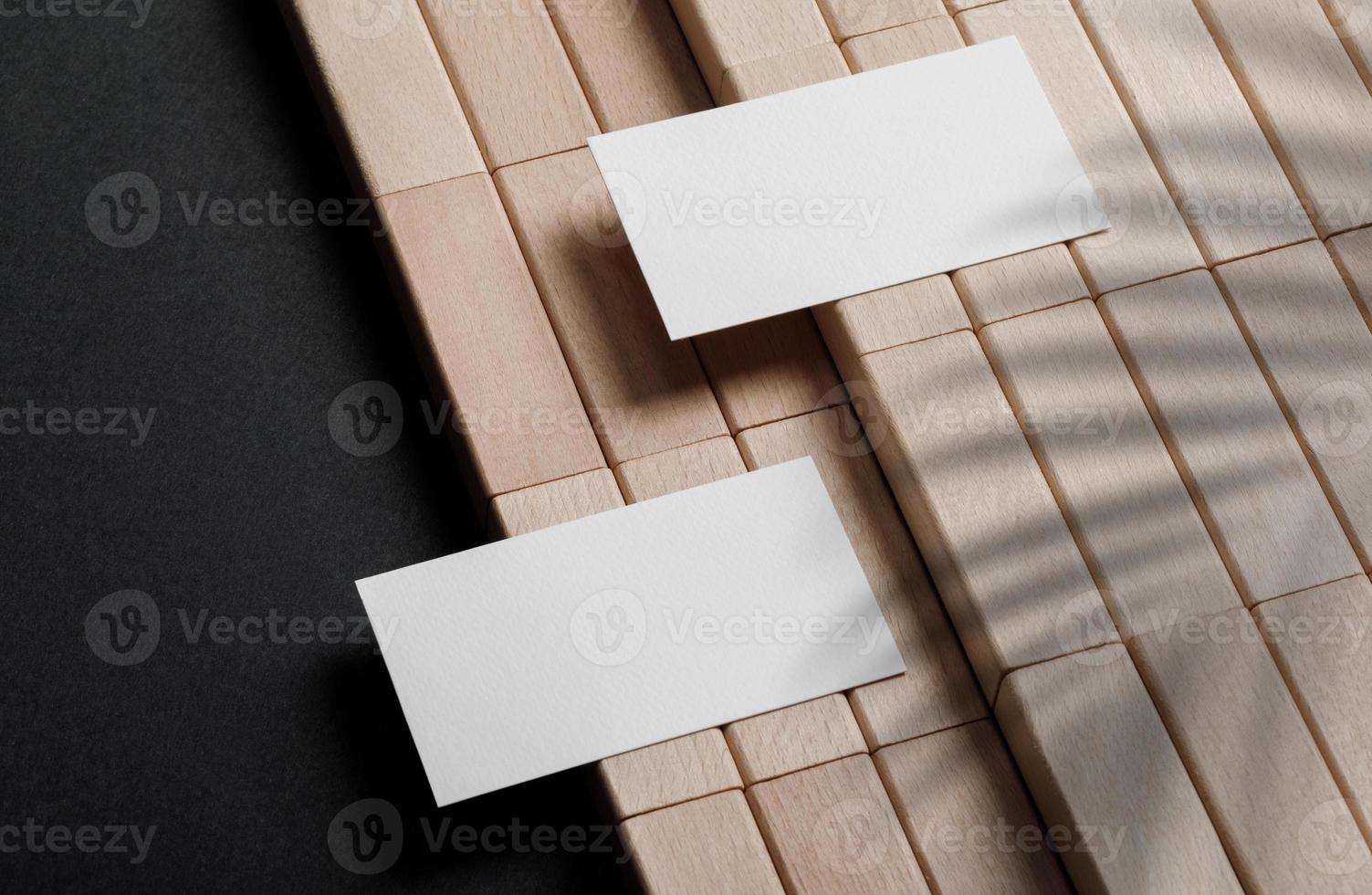 Minimal business card mockup with wooden block photo