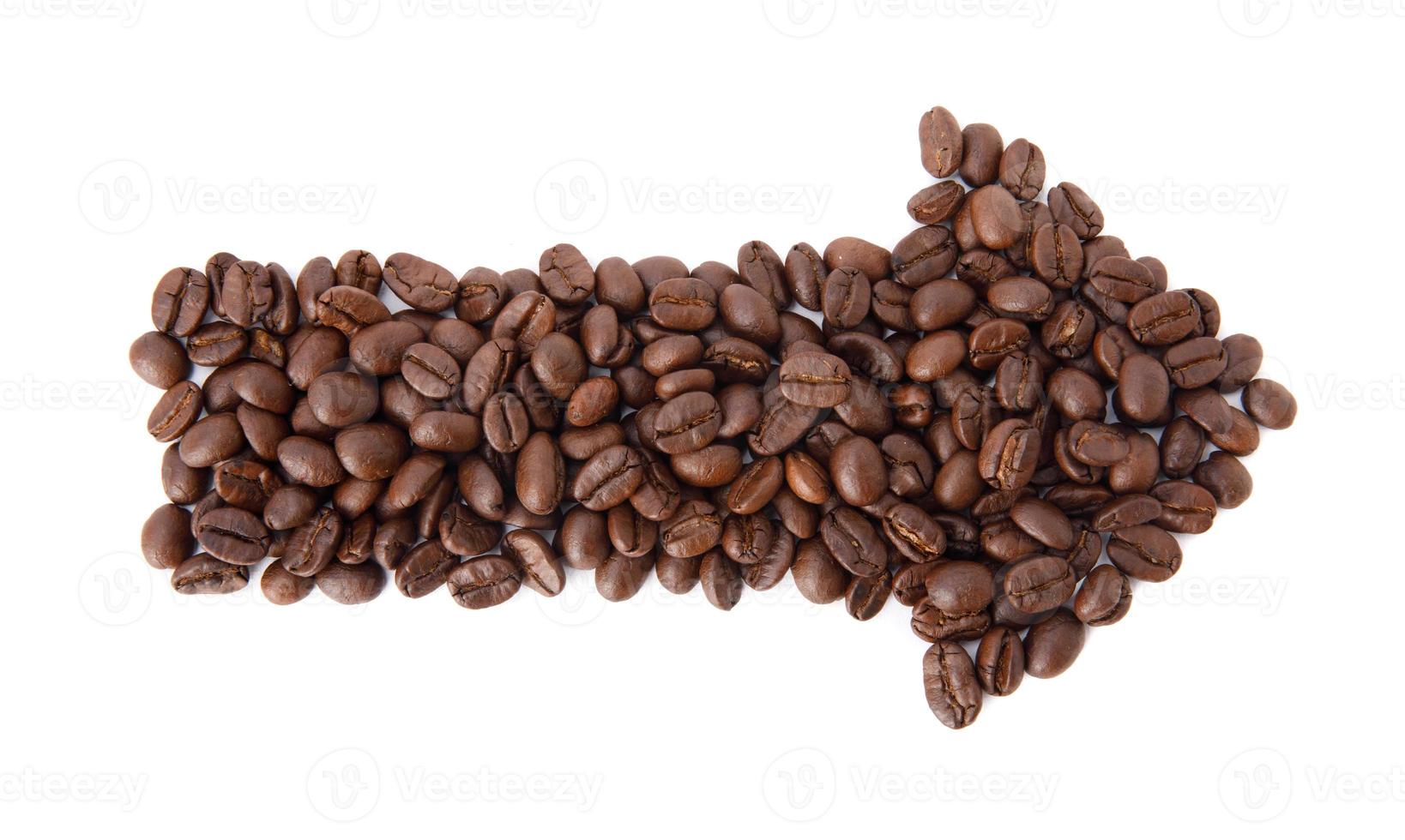 Roasted coffee beans in the shape of arrow studio shot isolated on white background, Healthy products by organic natural ingredients concept photo