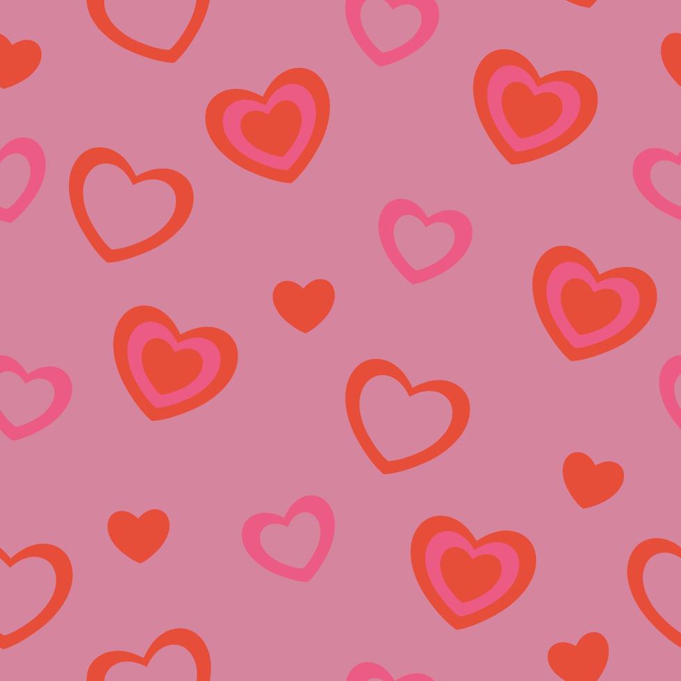 Seamless pattern with red and pink hearts. Vector graphics.