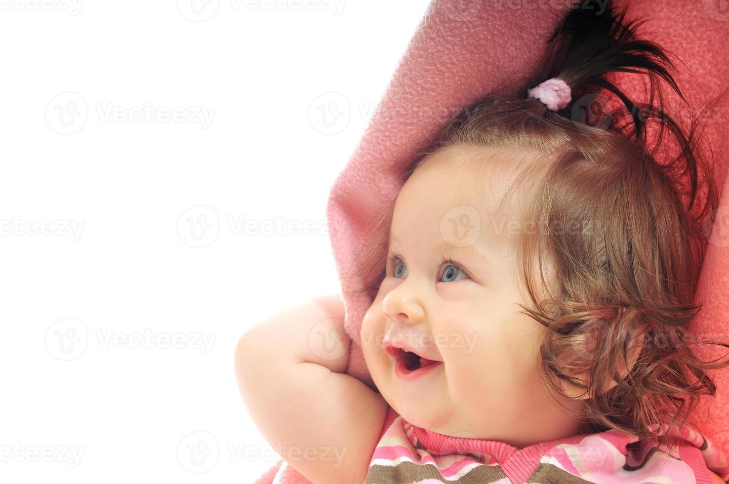 cute baby under  blanket photo