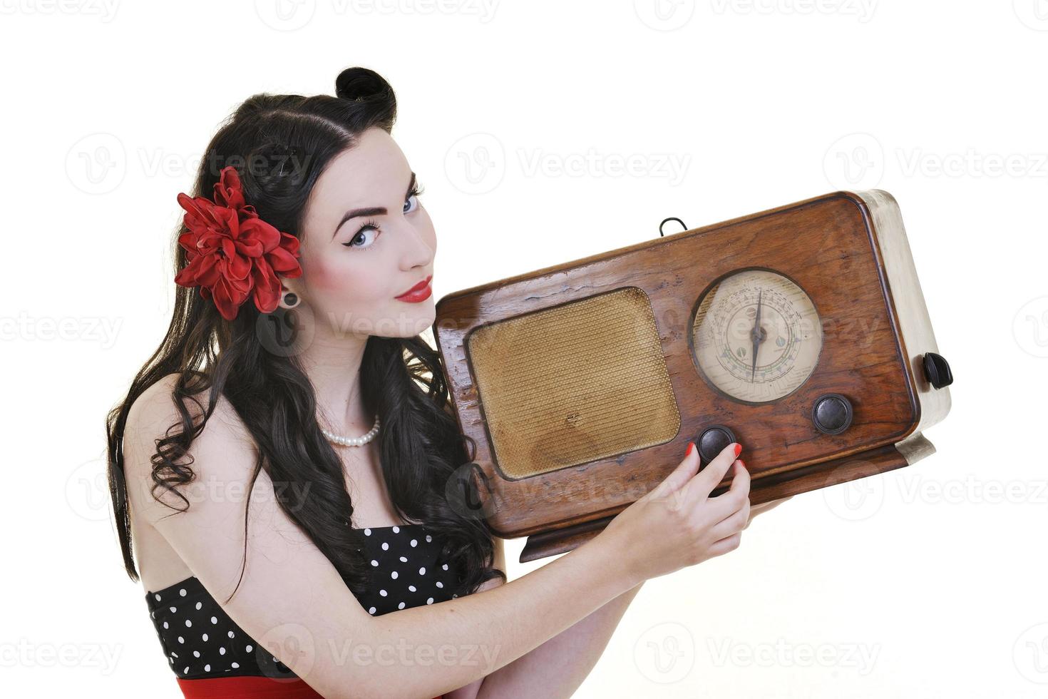 pretty girl listening music on  radio photo