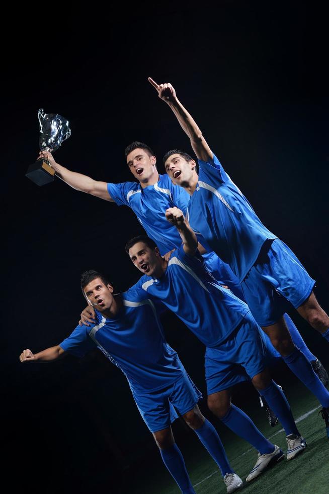 soccer players celebrating victory photo