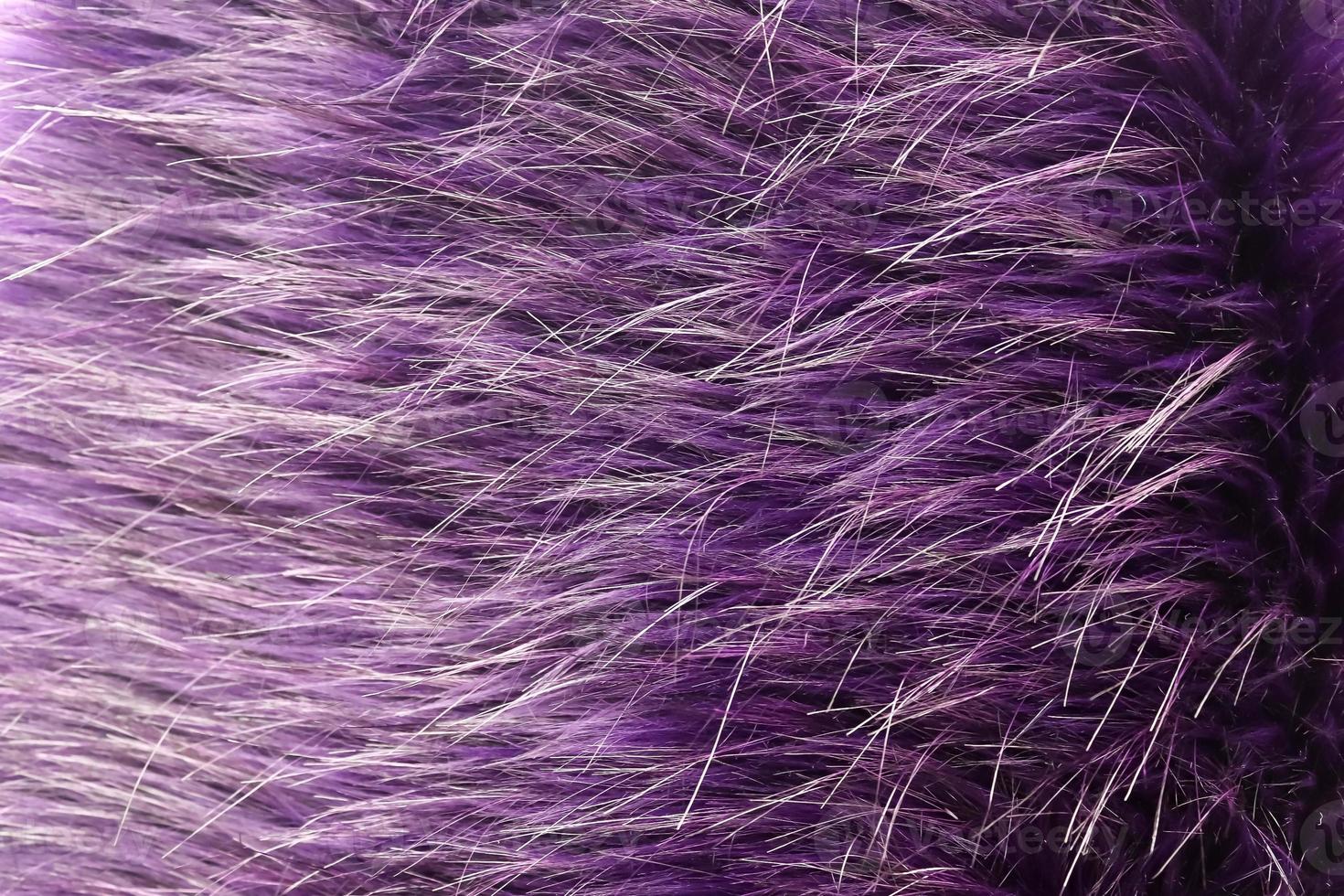 Detailed close up view on samples of cloth and fabrics in different colors found at a fabrics market photo
