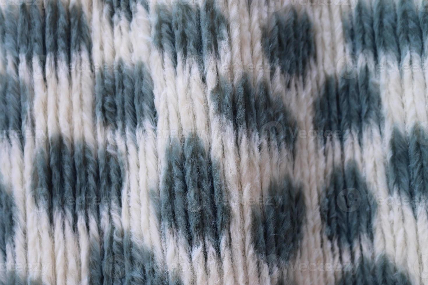 Detailed close up view on samples of cloth and fabrics in different colors found at a fabrics market photo