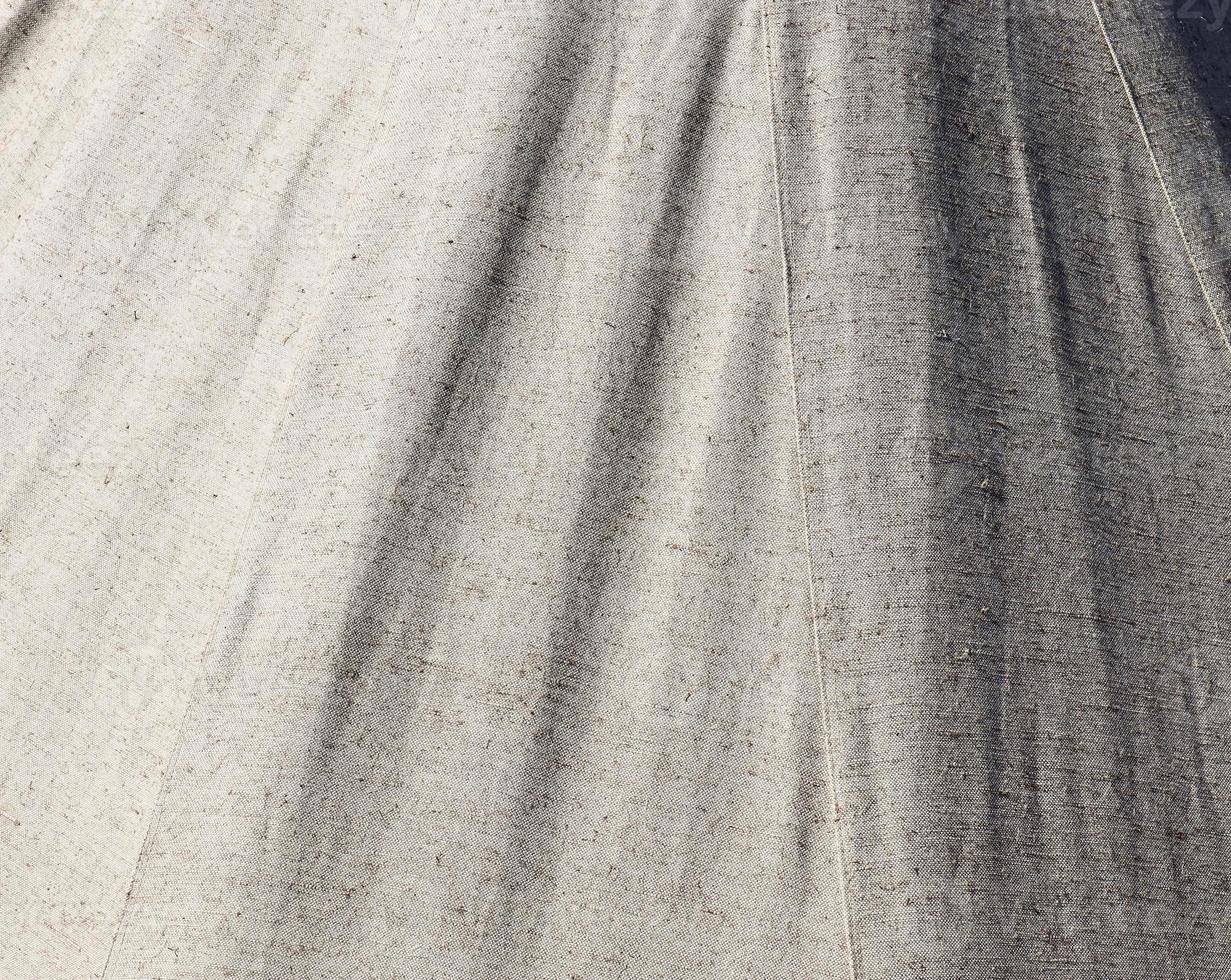 Detailed close up view on samples of cloth and fabrics in different colors found at a fabrics market photo