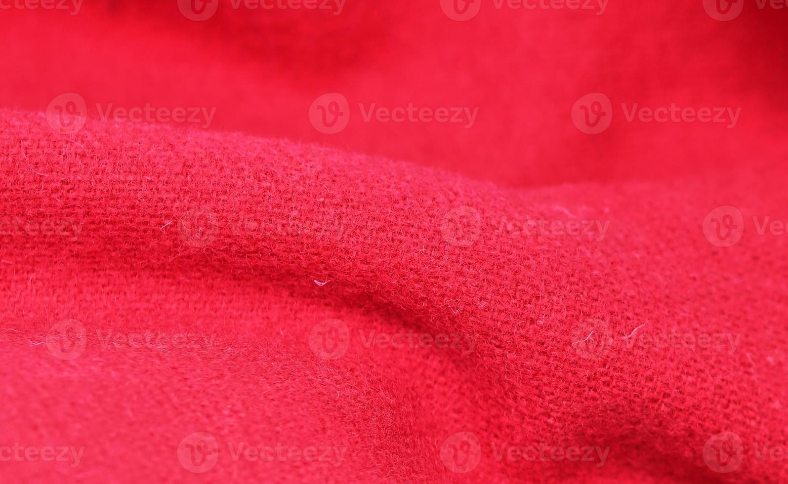 Detailed close up view on samples of cloth and fabrics in different colors found at a fabrics market photo