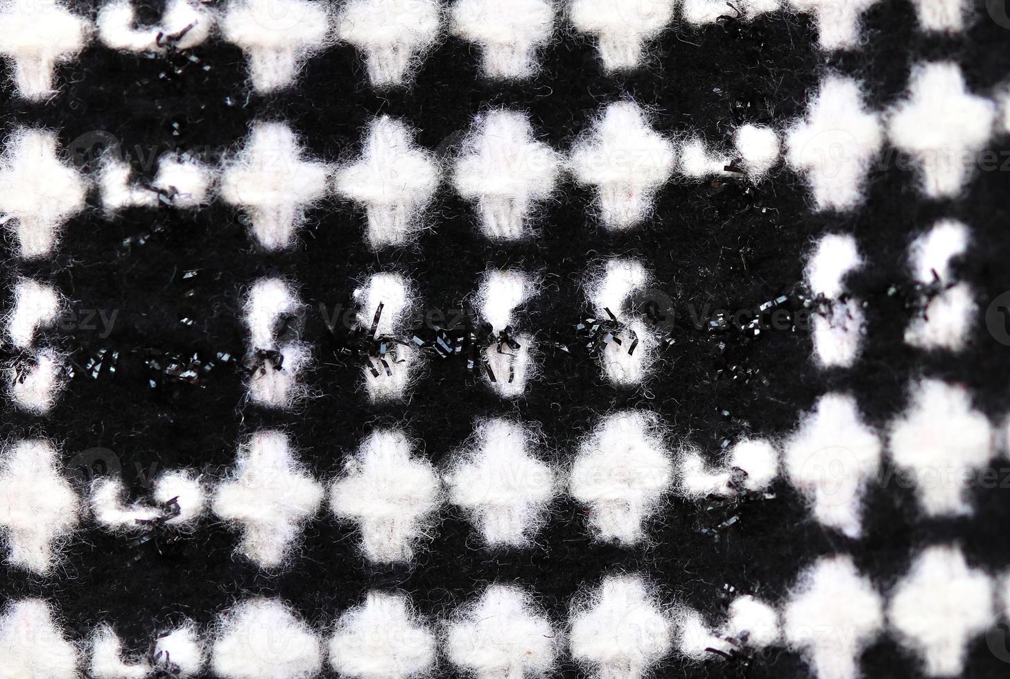 Detailed close up view on samples of cloth and fabrics in different colors found at a fabrics market photo
