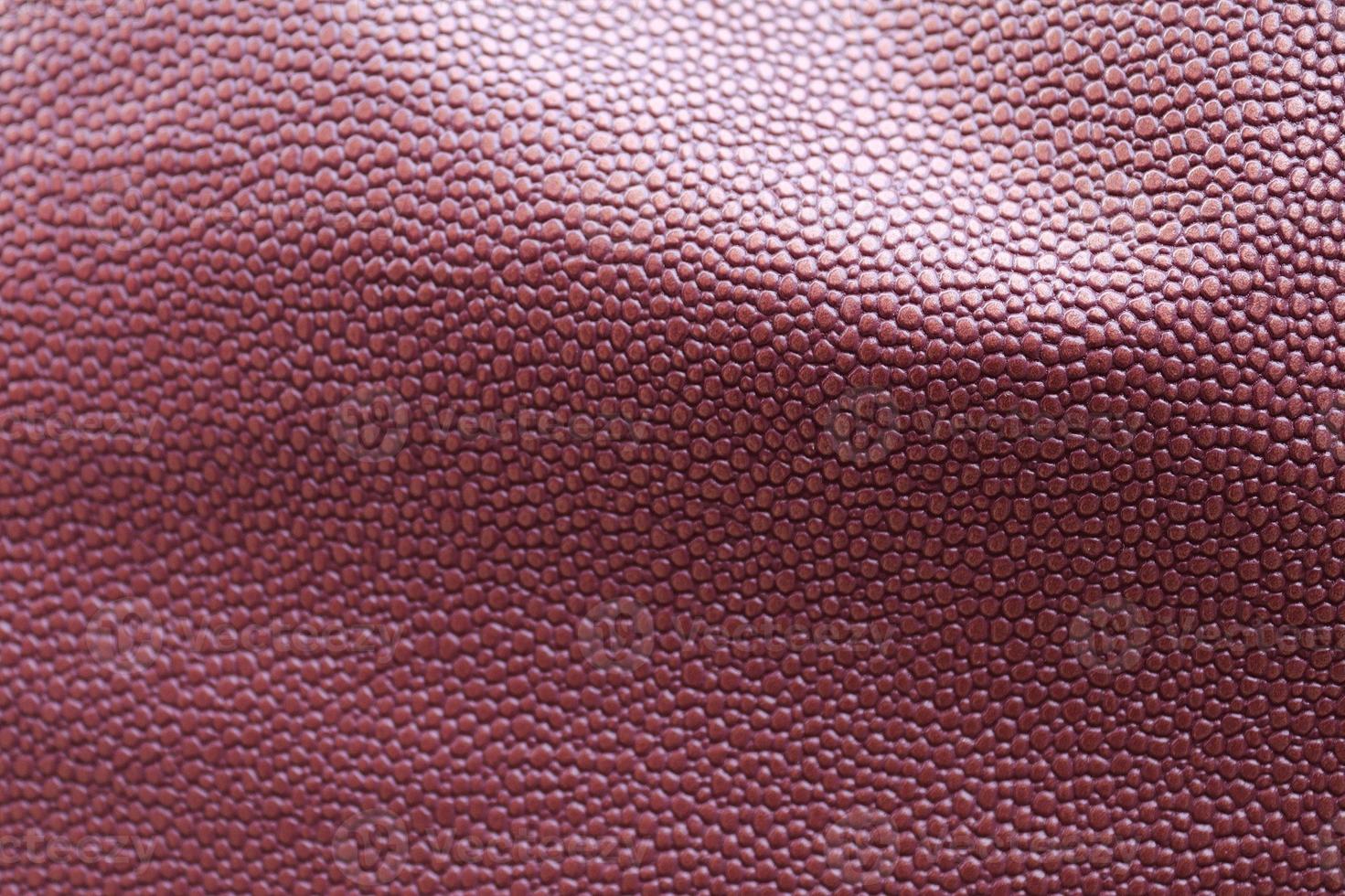 Detailed close up view on samples of cloth and fabrics in different colors found at a fabrics market photo