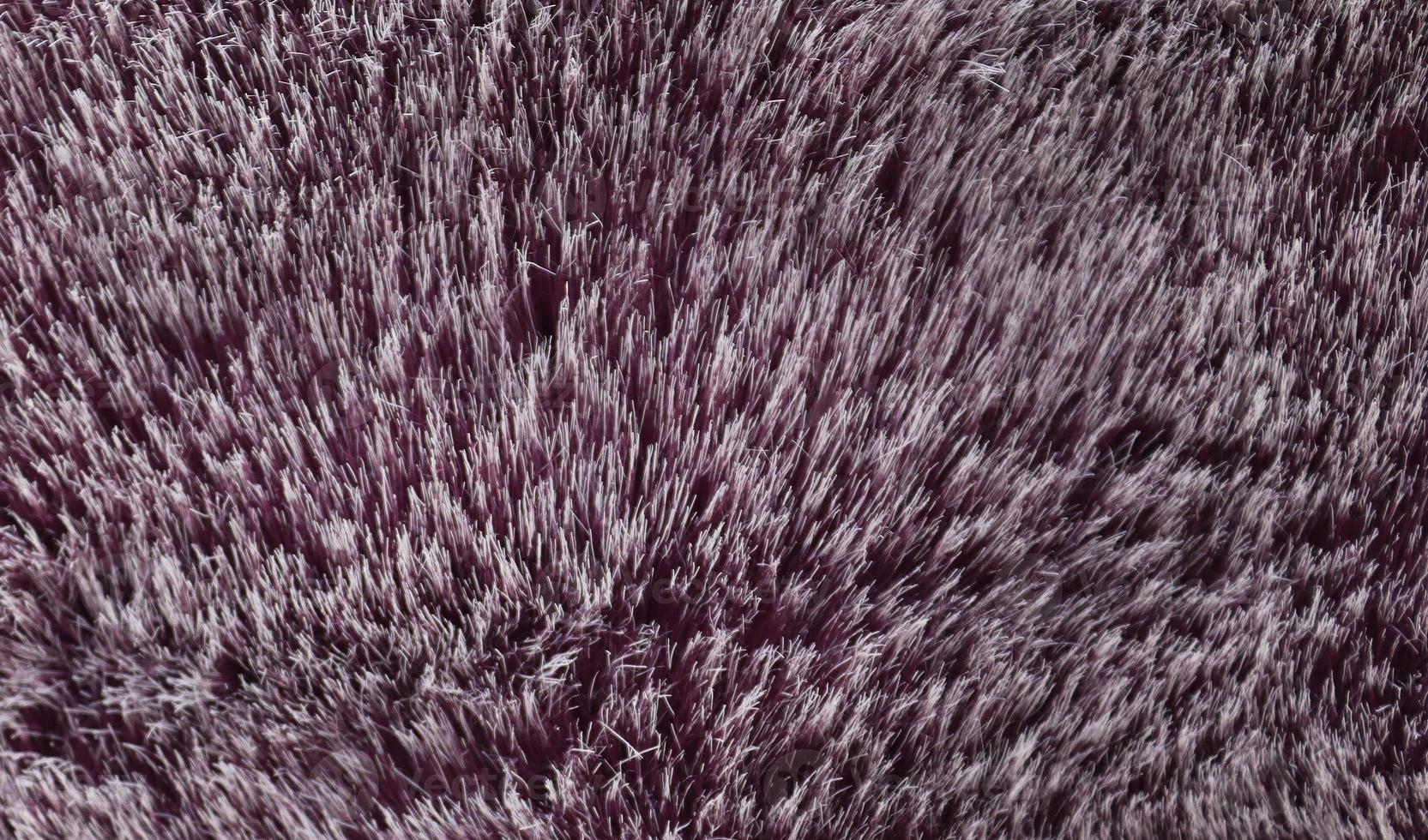 Detailed close up view on samples of cloth and fabrics in different colors found at a fabrics market photo
