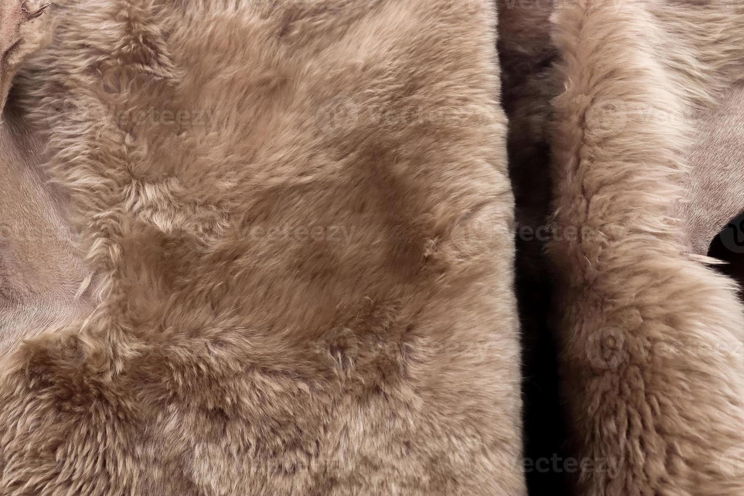 Detailed close up view on samples of cloth and fabrics in different colors found at a fabrics market photo