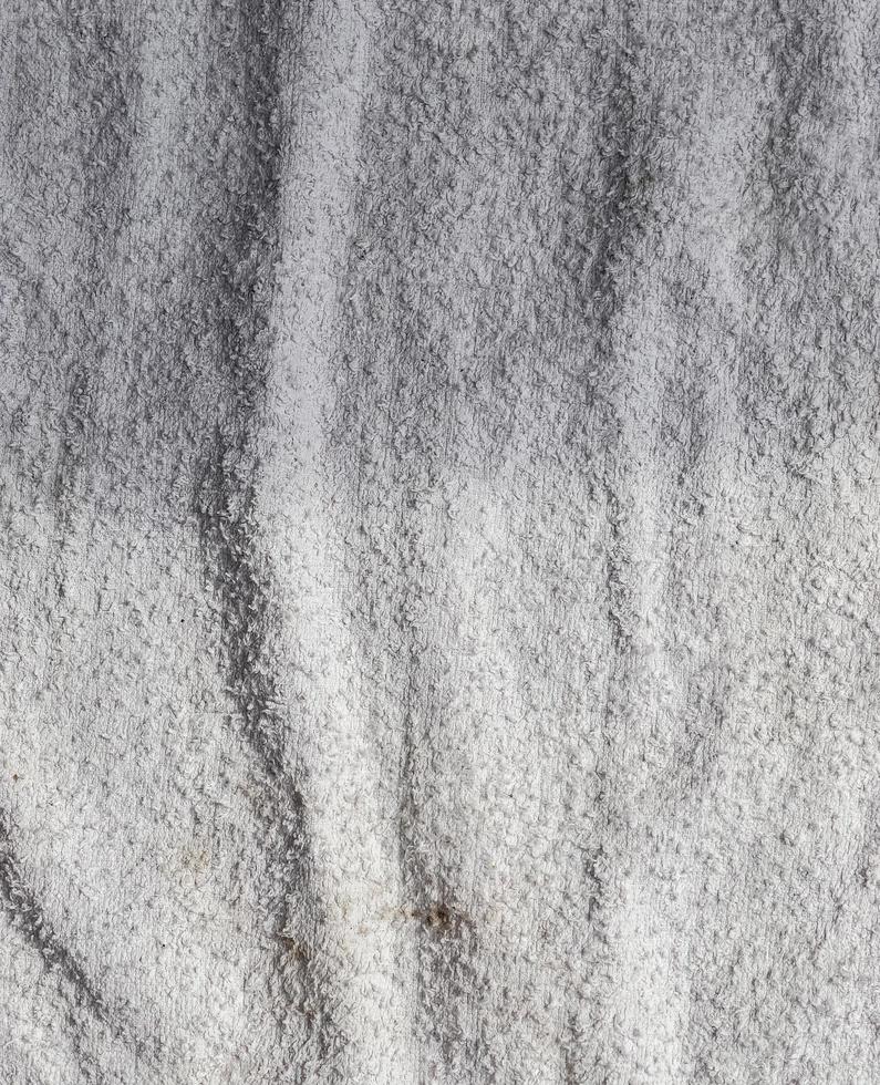 Detailed close up view on samples of cloth and fabrics in different colors found at a fabrics market photo