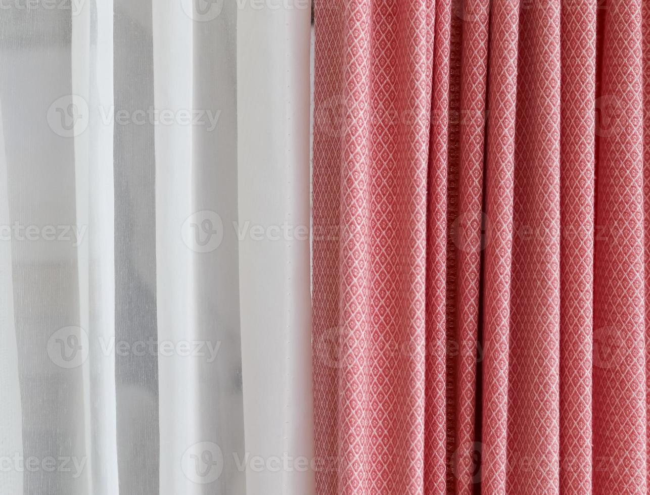 Detailed close up view on samples of cloth and fabrics in different colors found at a fabrics market photo