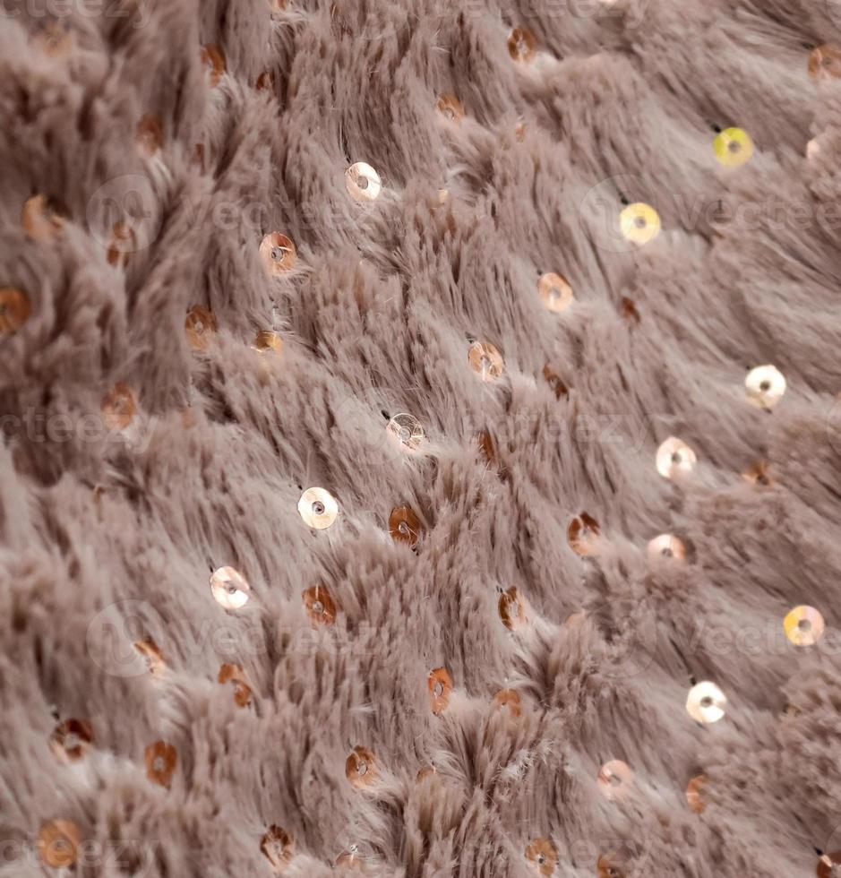 Detailed close up view on samples of cloth and fabrics in different colors found at a fabrics market photo