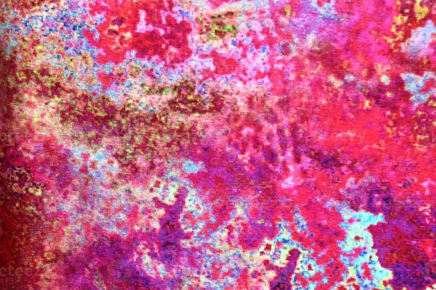 Detailed close up view on samples of cloth and fabrics in different colors found at a fabrics market photo