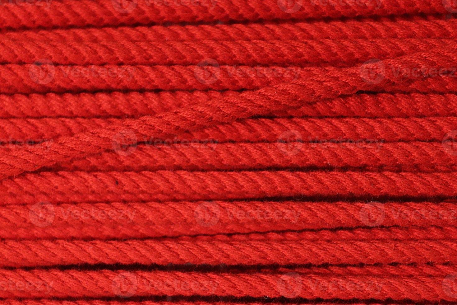 Detailed close up view on samples of cloth and fabrics in different colors found at a fabrics market photo