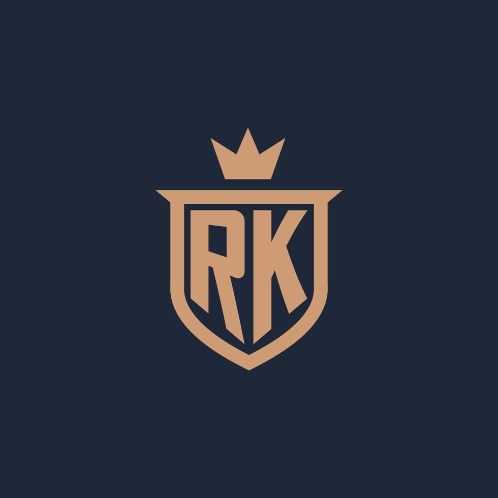 logotipo inicial del monograma rk con estilo escudo y corona vector