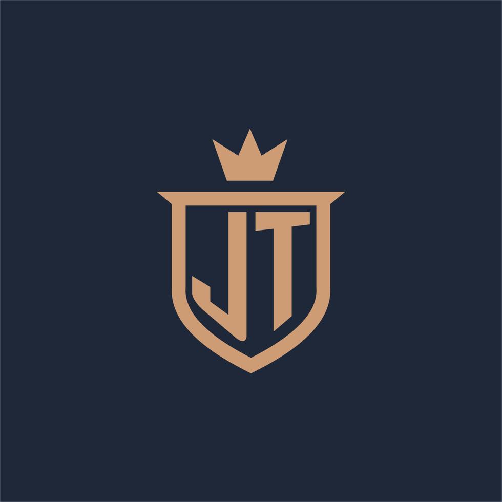 logotipo inicial del monograma jt con estilo de escudo y corona vector