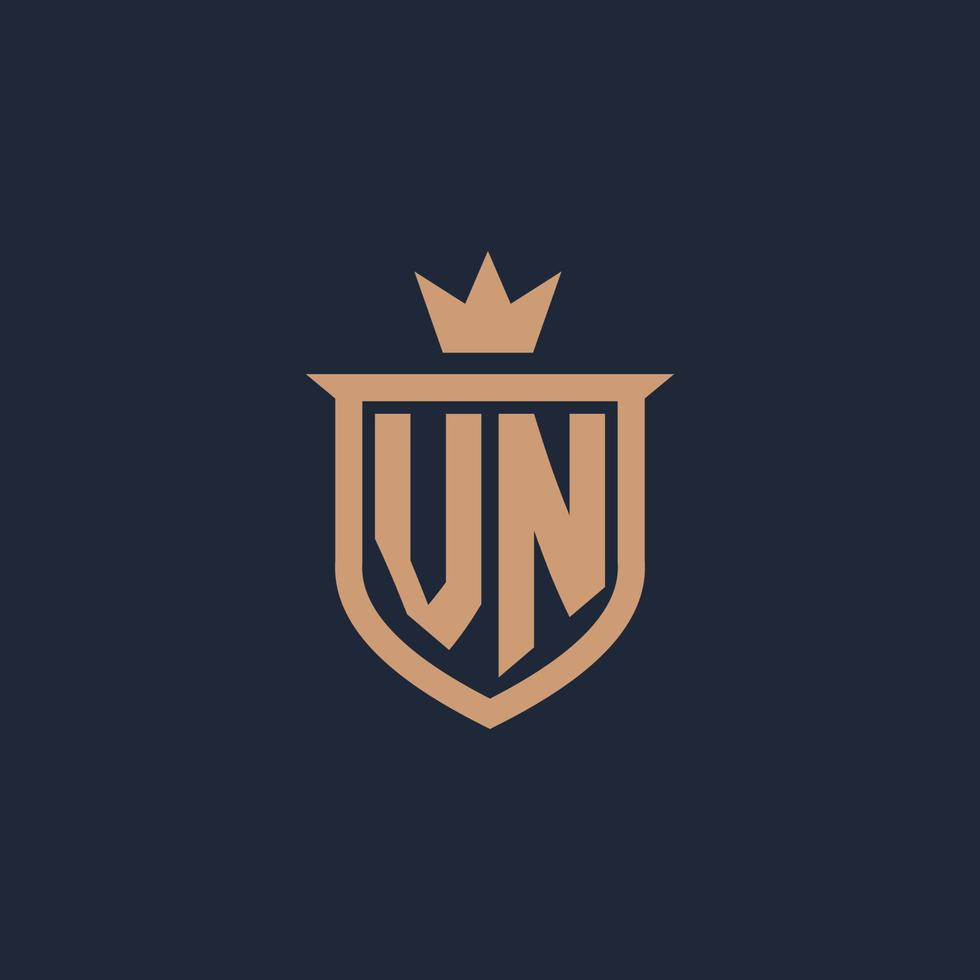 VN monogram initial logo with shield and crown style vector