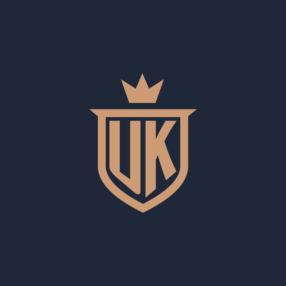 UK monogram initial logo with shield and crown style vector