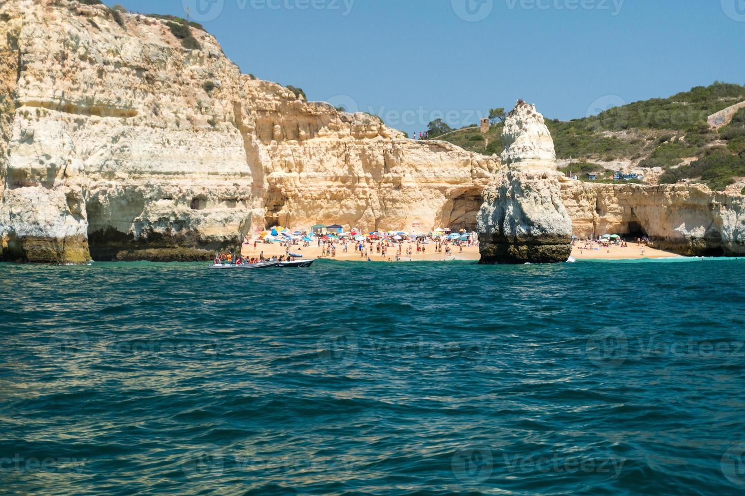 View from the boat of the beautiful Algarve coast in southern Portugal during a sunny day photo