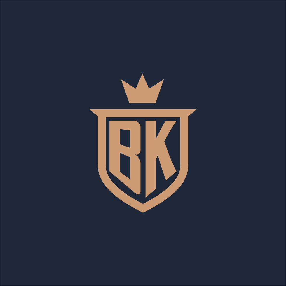 logotipo inicial del monograma bk con estilo de escudo y corona vector