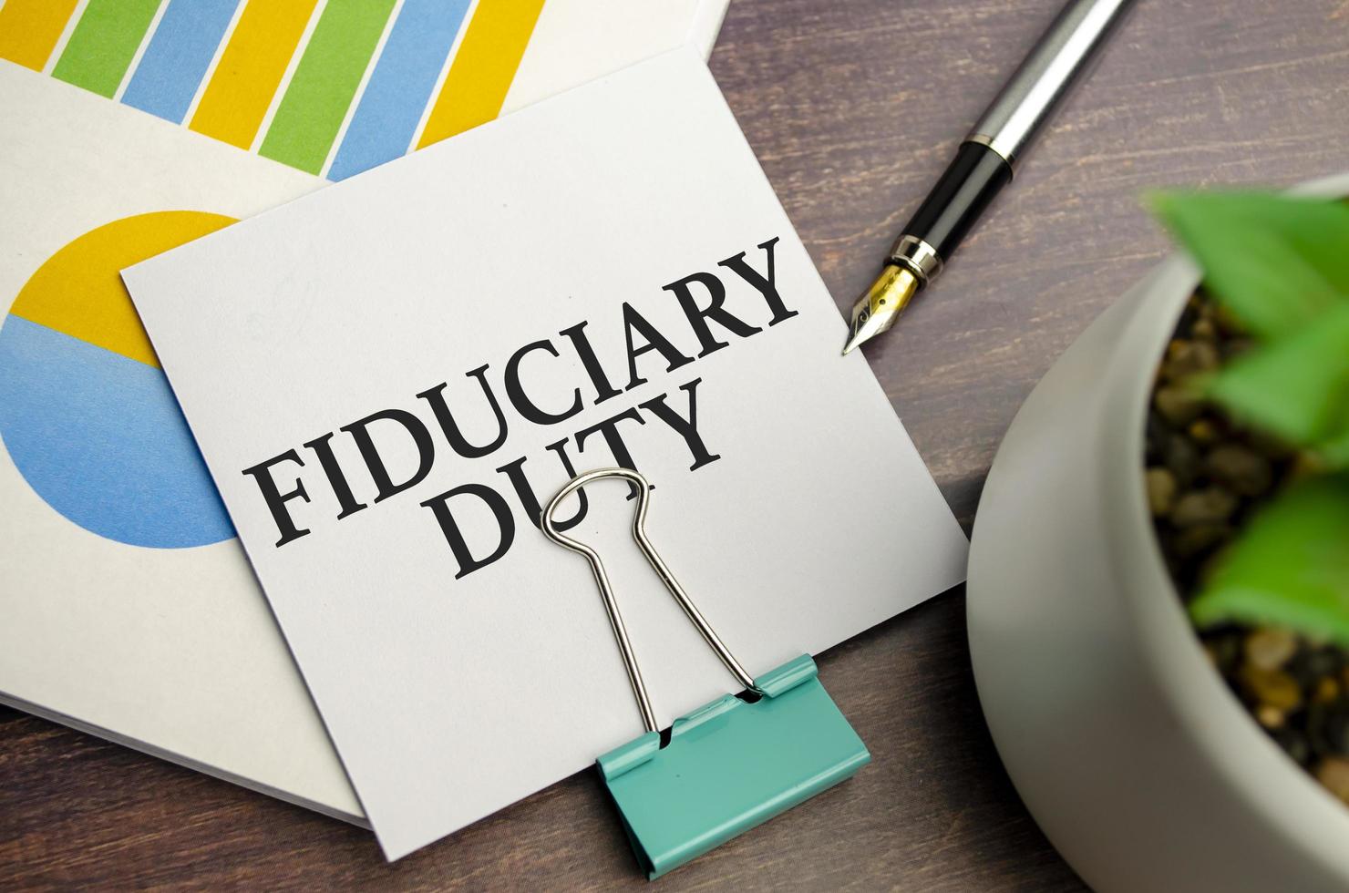 fiduciary duty text on the sticker and charts photo