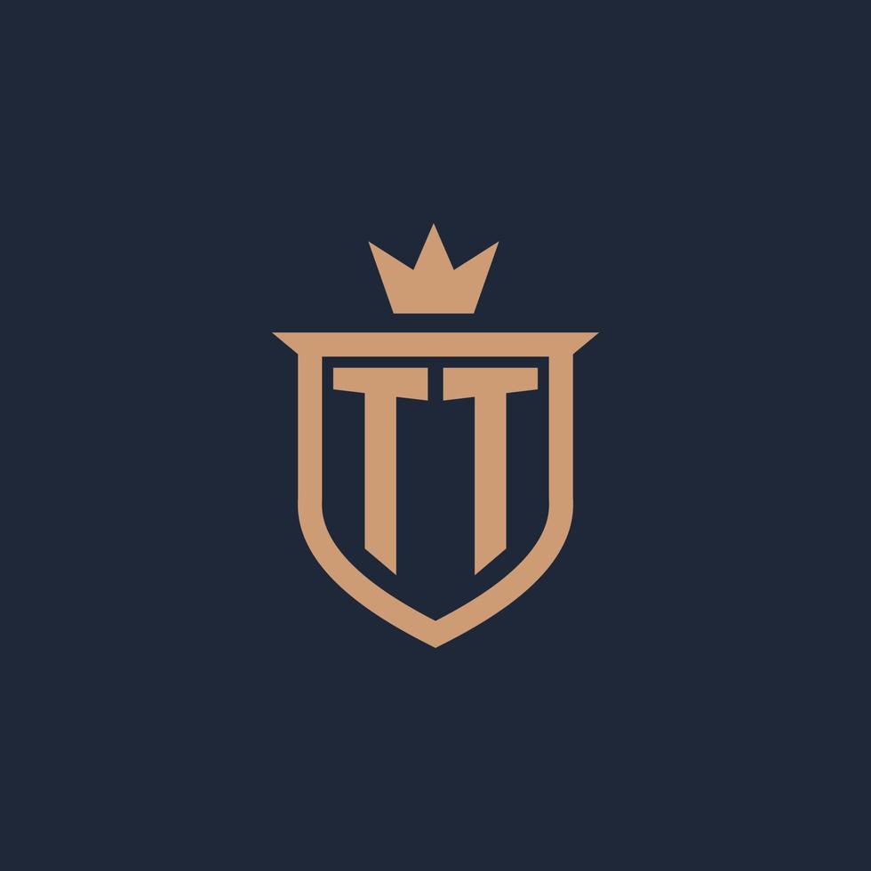 logotipo inicial del monograma tt con estilo de escudo y corona vector