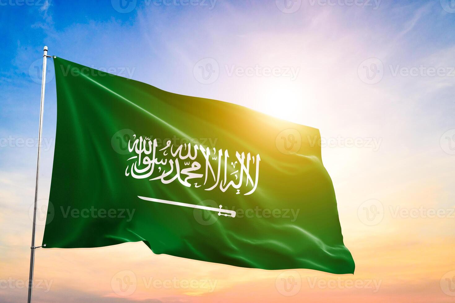 Saudi Arabia national flag waving in beautiful clouds. photo