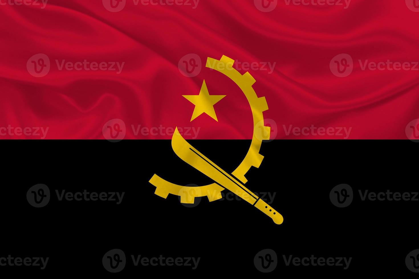 3d bandera de angola en tela foto