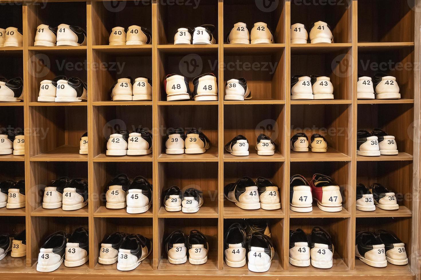 rack with shoes for bowling in different sizes. Horizontal view photo