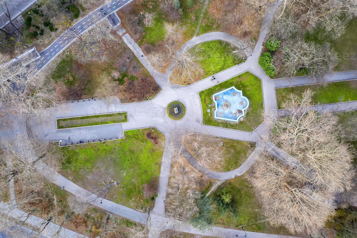 top view from drone of city park walkways and trees. Architecture element photo