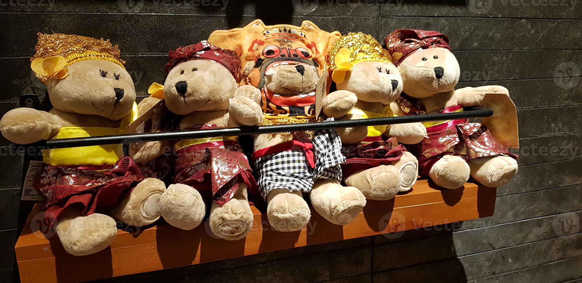 Group of Fluffy Stuffed Bear Toys Wearing various Clothes, teddy bear stuffed animal photo