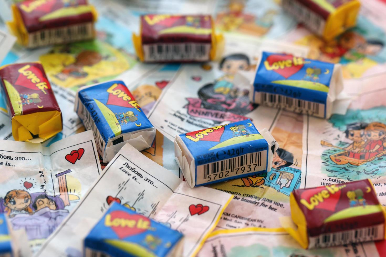 Ternopil, Ukraine - May 8, 2022 Love is - turkish bubble gums from 1990s popular in russian region. Various flavors of Love is chewing gum with liners about love photo