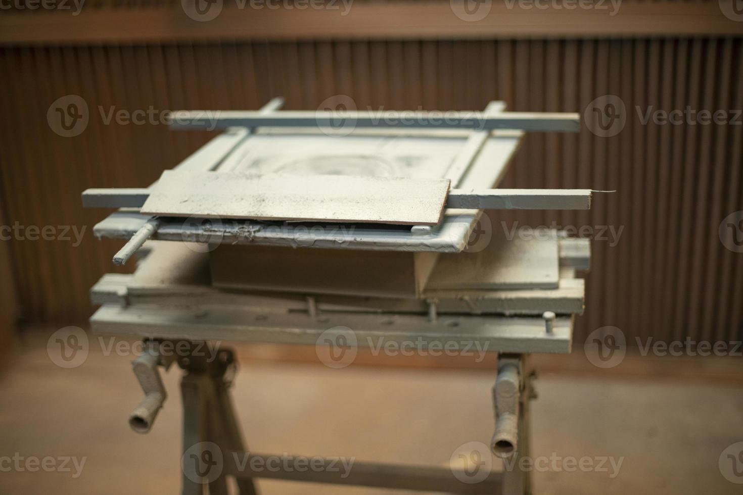 Table for painting parts. Table in workshop. photo