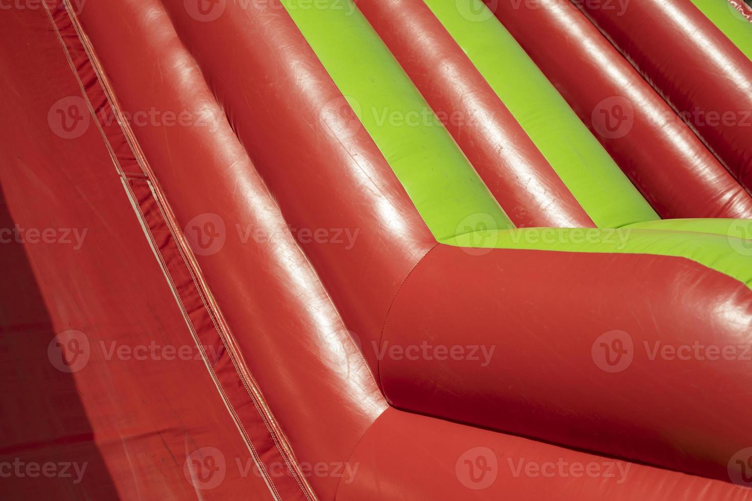 Children's fun in summer. Inflatable trampoline for jumping. photo