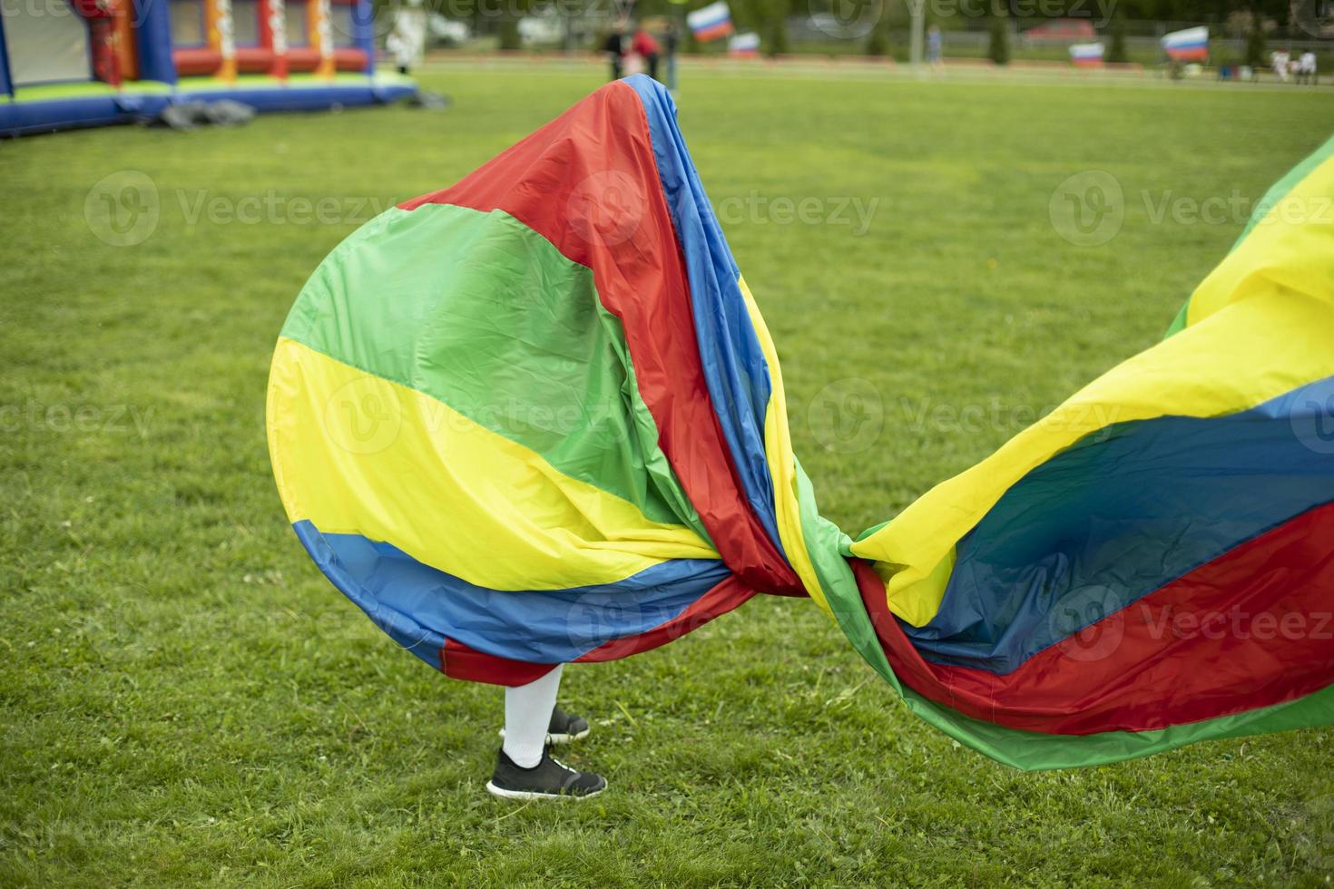 Colored fabric. Inventory for fun. Sports relay. Details of holiday. photo