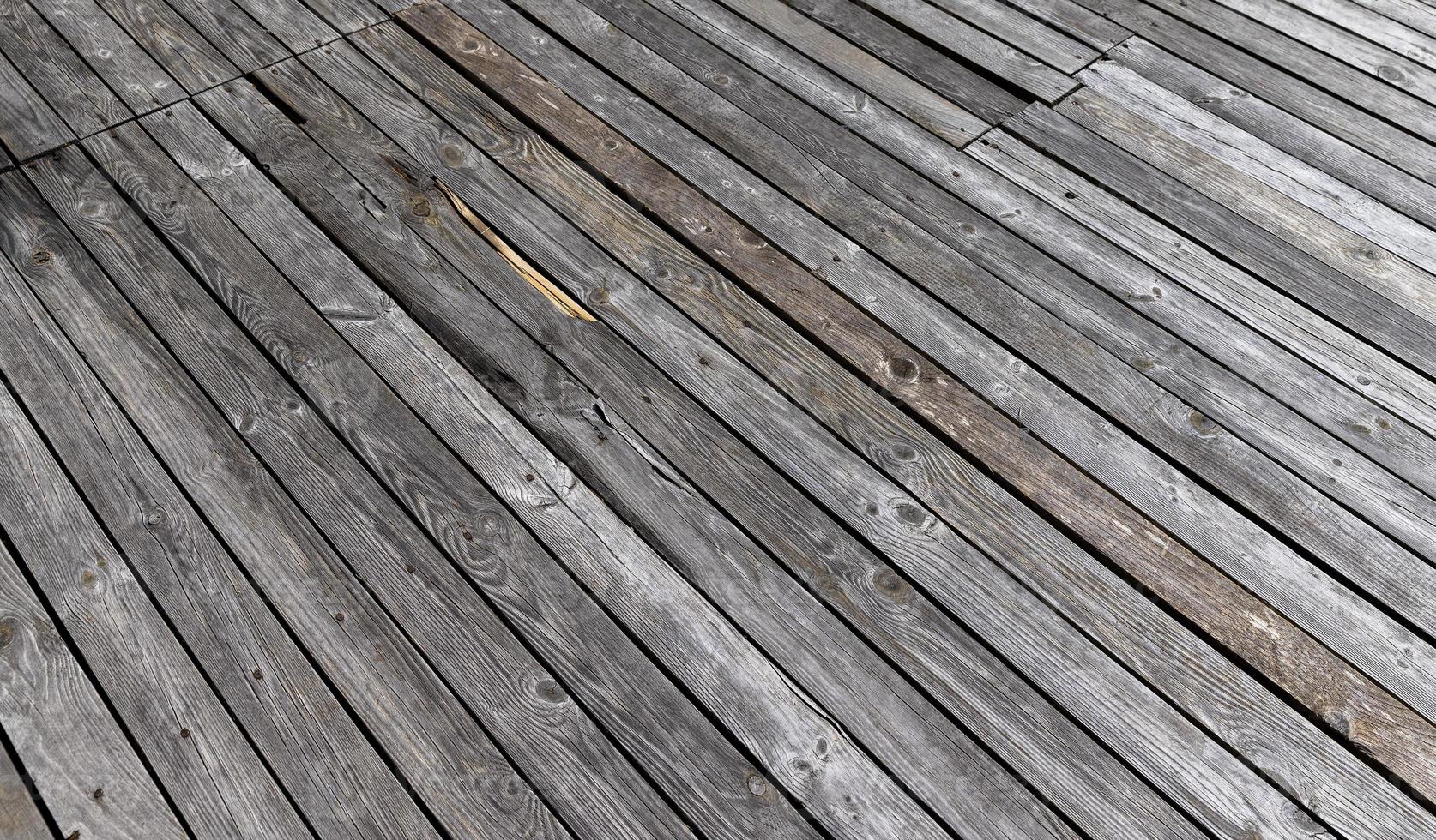 Wooden part of a walking road near the lake photo