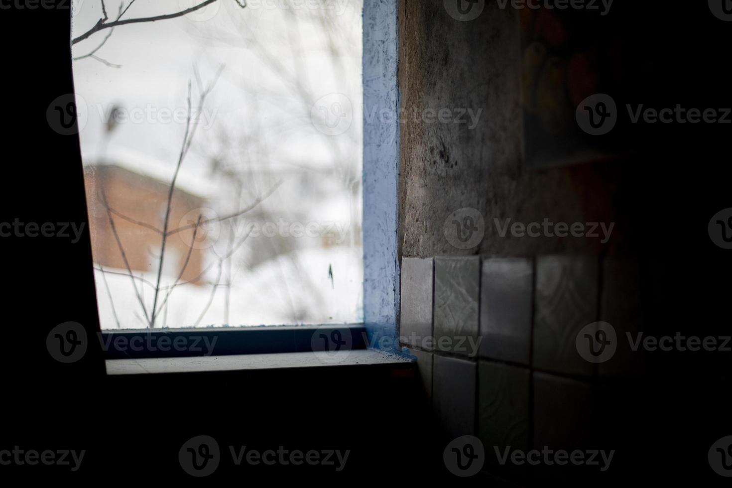Light from window. View from old window. photo